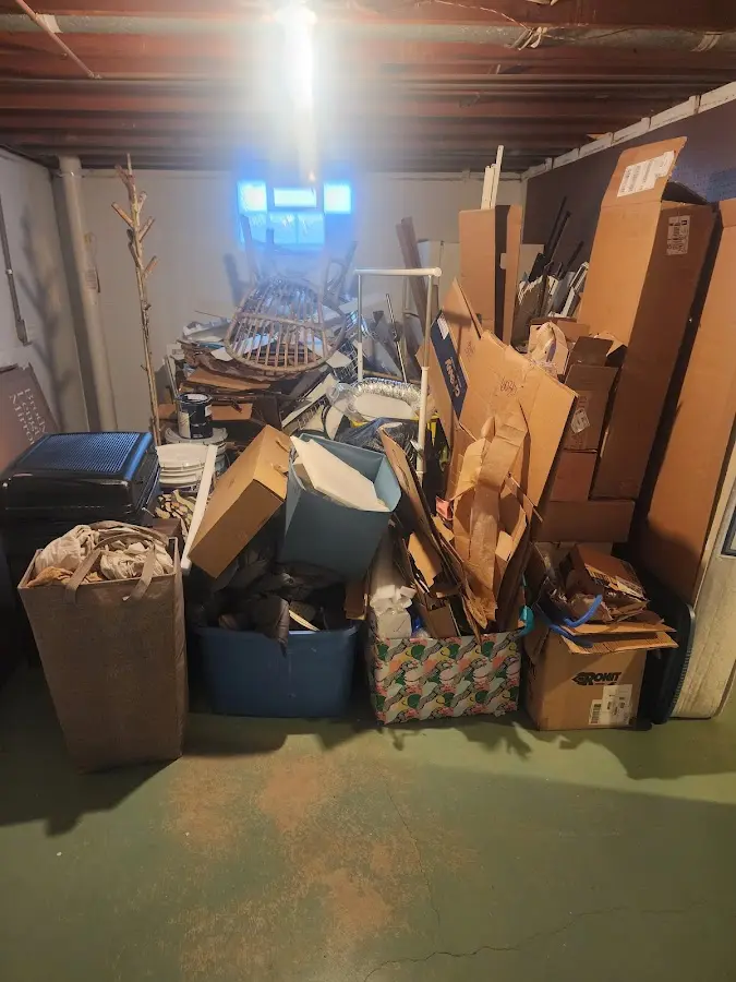 Roll-off dumpster container at job site for Cleanout Dumpster Rental in Eugene